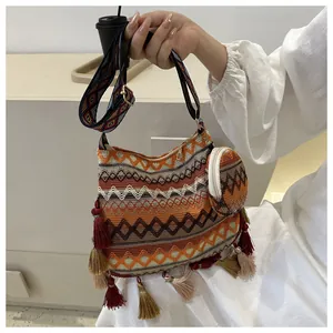 Bohemian ethnic woven shoulder bag with colorful tassels and matching small coin purse
