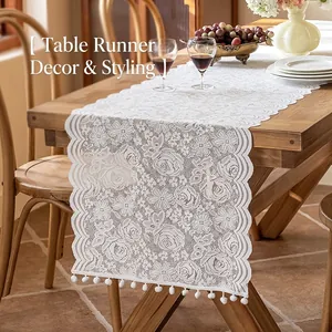 French style white lace table runner with floral patterns and pom-pom tassels