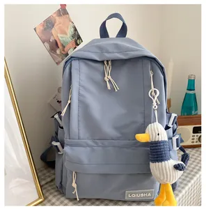 Mori style large capacity blue school backpack for girls including a cute duck charm