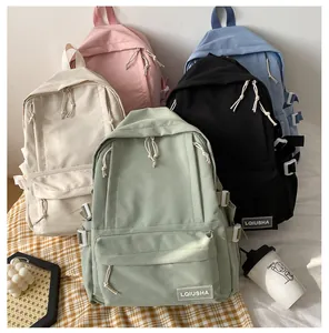 Collection of multi-color minimalist backpacks in pastel shades like mint and pink