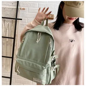 Sage green large capacity school backpack for girls in Korean college style.