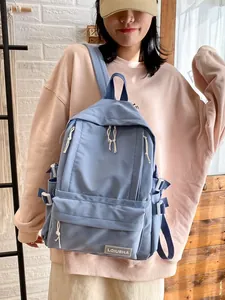 Korean style solid light blue backpack for students with large capacity and college vibe.