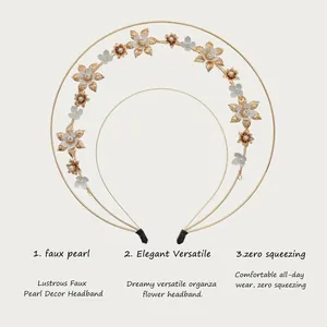 Detail view of golden multi-layered floral headband with organza flowers and faux pearls