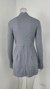 Back view of a slim-fit grey long-sleeved mini dress on a clear mannequin