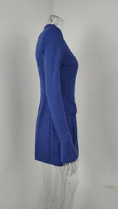 Side view detail of a royal blue long-sleeved bodycon mini dress on mannequin