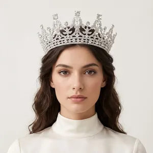 Stunning model wearing an intricate vintage silver rhinestone crown for pageant or photography