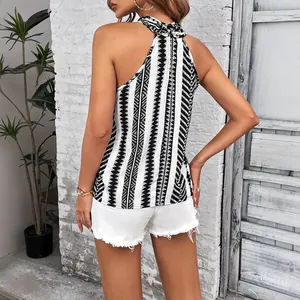 Women's halter neck sleeveless blouse with black and white geometric stripes back view