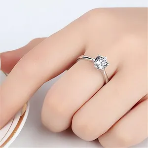 Elegant silver solitaire engagement ring with round brilliant cut cubic zirconia