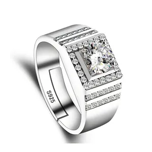 Close-up of a silver men's ring featuring a large center stone and small zircon accents