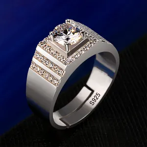 Close-up of men's S925 silver open ring with round cubic zirconia and pave stones.