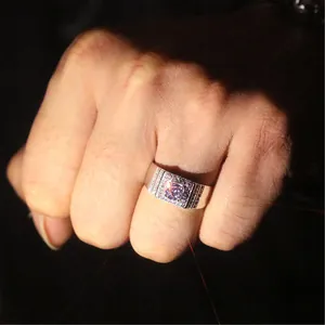 High-quality men's silver ring featuring a purple zircon stone and side accents