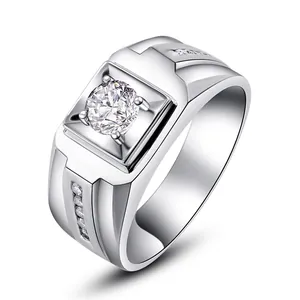 Close-up of a men's silver-tone ring featuring a large brilliant round-cut zircon