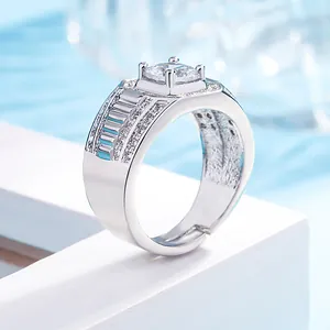 Macro detail showing a men's square-cut cubic zirconia ring with an adjustable silver band.