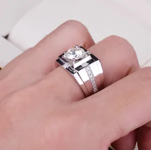 Macro detail of a bold men's ring with a large square zircon and side stones.