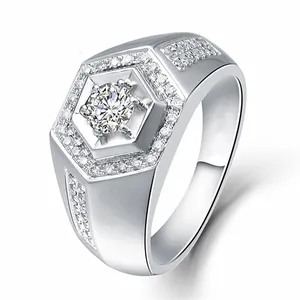 Macro detail of men's silver ring featuring a large hexagonal zircon center stone setting