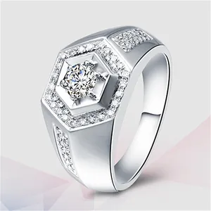 Detailed macro view of a men's hexagonal silver ring with a sparkling round-cut stone.