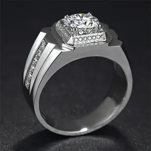 Detailed close-up of a bold men's silver ring featuring a large radiant central zircon stone