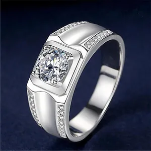 Elegant silver-toned men's wedding ring with a large round brilliant cubic zirconia