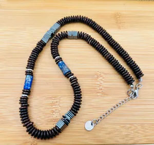 Vintage style handcrafted coconut shell and blue stone beaded necklace details