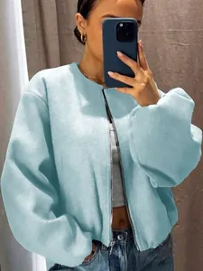 Detailed view of a fashionable light blue soft texture bomber jacket for women's wear