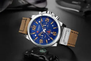 Detailed view of CURREN 8314 men's business quartz watch with blue dial and leather strap.
