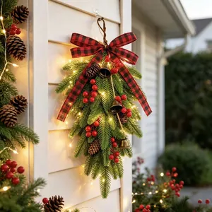 Detailed view of Christmas teardrop swag featuring LED lights and red buffalo plaid bow