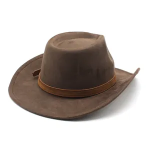 Detailed view of a vintage brown suede western cowboy hat with decorative band