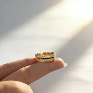 Detailed macro view of vintage gold ring with blue sapphire and diamond stones