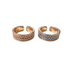 Elegant rose gold triple-row sparkling adjustable rings set with blue and white stones