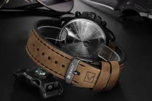 Detailed back view of CURREN 8314 watch with stainless steel case and brown leather strap