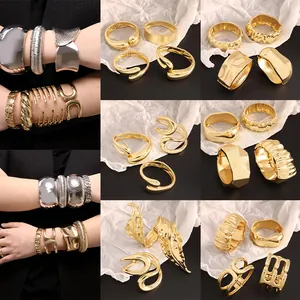 Juego de brazaletes de aleación irregulares en oro y plata para un estilo de moda elegante.