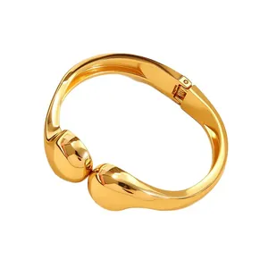 Brazalete abierto moderno y minimalista de aleación dorada irregular con bisagra para mujer