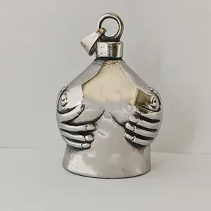 Vintage silver motorcycle guardian bell featuring a detailed female torso design