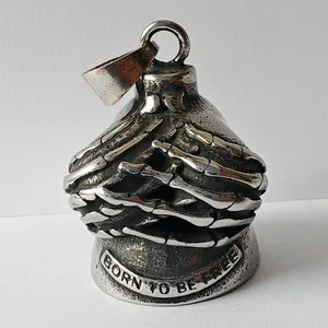 Detailed view of retro stainless steel motorcycle guardian bell with skeleton hands