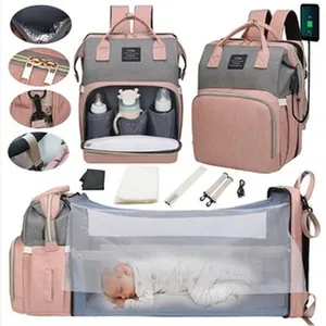 Detail of multifunctional diaper bag with foldable baby bed and USB charging port