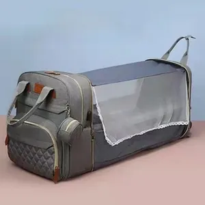 Detail view of the multi-functional diaper bag expanded into a portable baby bassinet.