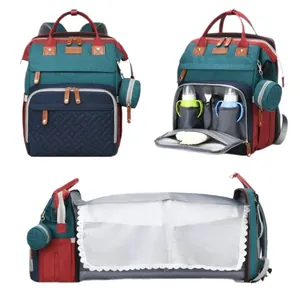 Multifunctional diaper bag with portable folding baby bed and nursing bottle compartments