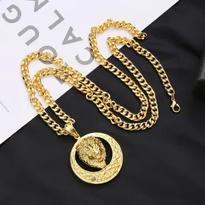 Bold hip-hop style gold-toned lion head circular pendant necklace with a chunky Cuban chain