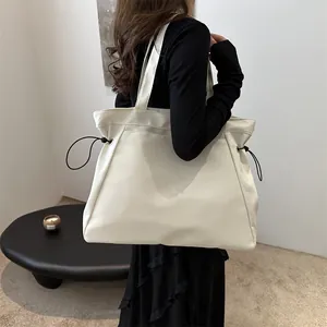 Minimalist large white canvas tote bag for women, versatile shoulder bag for commuting