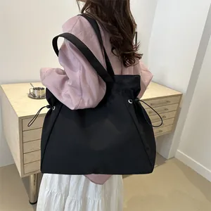 Large capacity black tote bag for women minimalist canvas shoulder bag for daily commute