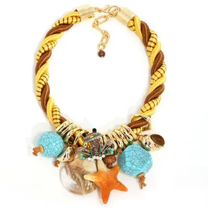 Exquisite Bohemian ocean style necklace featuring starfish, shells and turquoise