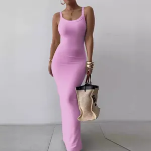 Elegant sleeveless pink bodycon maxi dress featuring ribbed fabric and spaghetti straps