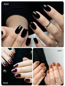Gel nail polish colors display featuring cherry red, black and caramel brown shades.