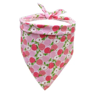 Pink cotton dog bandana with cute red apple fruit pattern and tie-on design