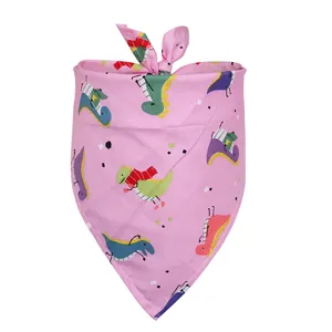 Soft pink cotton pet bandana featuring cute colorful cartoon dinosaur print patterns