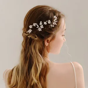 Elegant bridal hair pins set with white flowers and crystal rhinestones for wedding