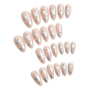 Elegant almond-shaped press-on nails featuring silver stars and sparkling rhinestones