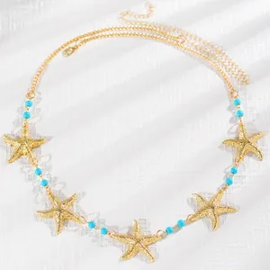 Chaîne de taille vintage étoile de mer dorée avec perles turquoises pour style de plage