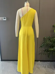 Detailed back view of a yellow one-shoulder wide-leg jumpsuit displayed on a mannequin.