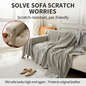 Manta para sofá gris claro con patrón de espiga para protección de muebles todo el año
